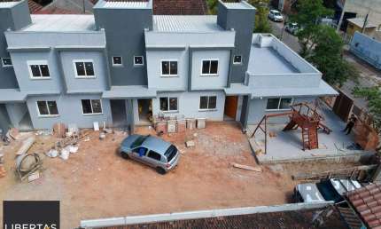 Casa em condomínio fechado com 2 quartos à venda na Rua Miguel Ascoleze, 125, Vila Nova, Porto Alegre