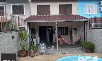 Casa com 3 quartos à venda na Rua Doutor João César Krieger, 125, Rubem Berta, Porto Alegre