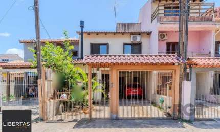 Casa com 3 quartos à venda na Rua Edgar Sanches Laurent, 77, Hípica, Porto Alegre