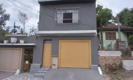 Casa com 8 quartos à venda na Rua Evangelista Francisco da Silva, 232, Cavalhada, Porto Alegre