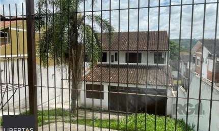 Casa com 3 quartos à venda na Rua Lloyd de Andrade Polidoro, 106, Ipanema, Porto Alegre