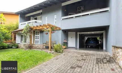 Casa com 4 quartos à venda na Rua Adão Pinheiro da Silva, 565, Ipanema, Porto Alegre
