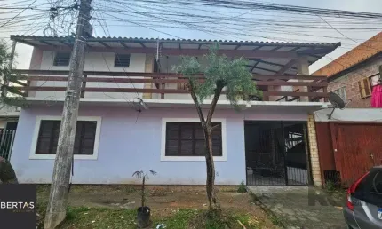 Casa com 3 quartos à venda na Rua Hesiodo Andrade, 270, Hípica, Porto Alegre