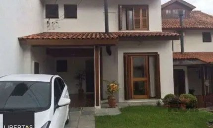 Casa em condomínio fechado com 3 quartos à venda na Avenida Eduardo Prado, 695, Cavalhada, Porto Alegre