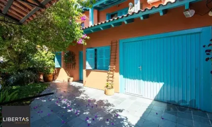 Casa com 3 quartos à venda na Rua Breno Rosa, 70, Vila Nova, Porto Alegre