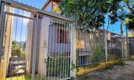 Casa com 4 quartos à venda na Rua Oscar Tollens, 63, Santa Tereza, Porto Alegre