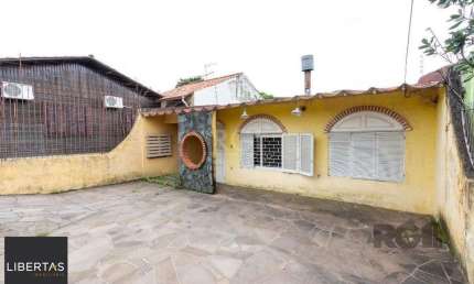 Casa com 3 quartos à venda na Estrada Aracaju, 70, Vila Nova, Porto Alegre