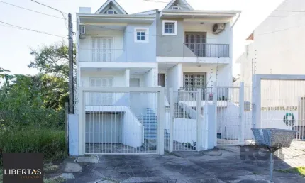 Casa com 3 quartos à venda na Rua Claudio da Silva Pinto, 608, Espírito Santo, Porto Alegre