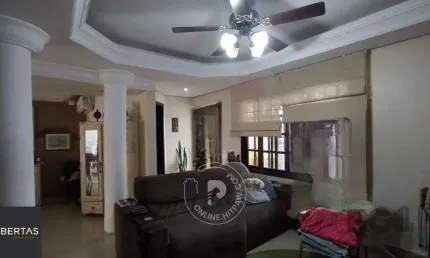 Casa com 3 quartos à venda na Rua Baldoino Bottini, 131, Hípica, Porto Alegre
