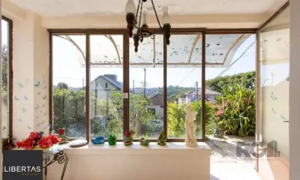 Casa com 2 quartos à venda na Rua Oscar Tollens, 242, Santa Tereza, Porto Alegre