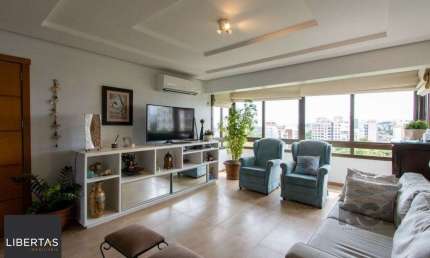 Apartamento possui 3 dormitórios, sendo 1 suíte, semi-mobiliado, com 107,27m² de área privativa, living para 2 ambientes, espaço gourmet com churrasqueira, cozinha com área de serviço; 2 vagas simples