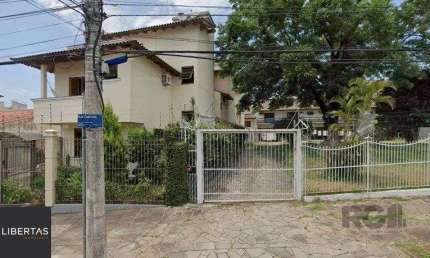 Casa em condomínio fechado com 4 quartos à venda na Rua Catumbi, 301, Medianeira, Porto Alegre