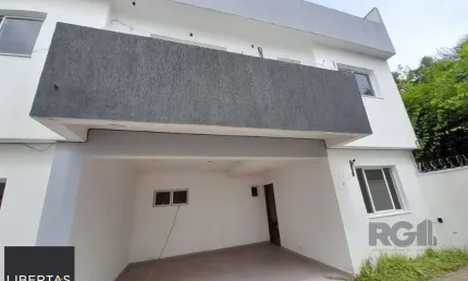 Casa em condomínio fechado com 3 quartos à venda na Rua Coronel Timóteo, 90, Camaquã, Porto Alegre