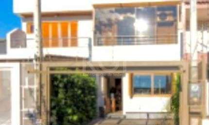 Casa com 3 quartos à venda na Rua Waldemar da Silva Tavares, 234, Guarujá, Porto Alegre