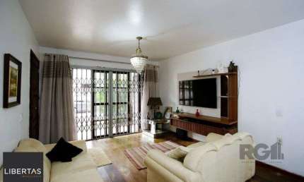 Casa com 3 quartos à venda na Rua Chile, 545, Jardim Botânico, Porto Alegre
