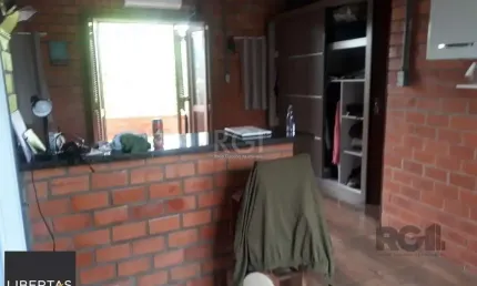 Casa com 3 dormitórios, sendo 1 suíte no bairro Hípica