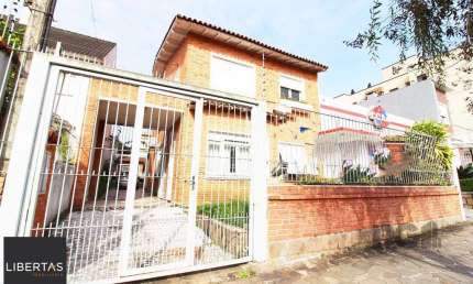 Casa à venda 4 quartos (dormitórios), suíte, 3 vagas - Partenon, Porto Alegre