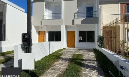Casa com 3 quartos à venda na Rua Itacyr Rossi, 195, Guarujá, Porto Alegre