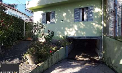 Casa com 3 quartos à venda na Rua Álvaro Nicofé, 97, Vila Jardim, Porto Alegre
