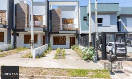 Casa com 3 quartos à venda na Rua Manoel Fernandes, 78, Guarujá, Porto Alegre