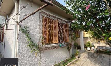 Casa com 3 quartos à venda na Rua Dona Firmina, 738, Vila São José, Porto Alegre