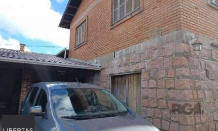 Casa com 3 quartos à venda na Estrada João Passuelo, 1100, Vila Nova, Porto Alegre