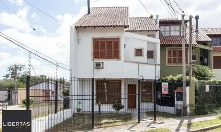Casa com 3 quartos à venda na Rua Mário Assumpção, 121, Serraria, Porto Alegre