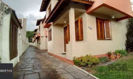 Casa em condomínio fechado com 2 quartos à venda na Rua Padre João Batista Reus, 2475, Camaquã, Porto Alegre