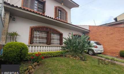 Casa com 4 quartos à venda na Rua Esteio, 220, Cavalhada, Porto Alegre