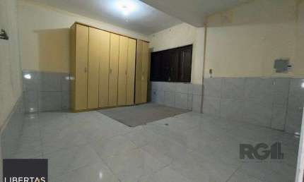 Casa com 5 quartos à venda na Rua Rafael Clark, 476, Partenon, Porto Alegre