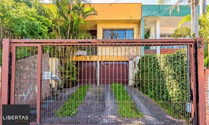 Casa para Venda - 165m², 3 dormitórios, 2 vagas - Partenon