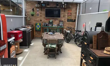 Casa com 3 dormitórios 2 suítes, área gourmet, vaga de estacionamento,  Guarujá,  Porto Alegre RS