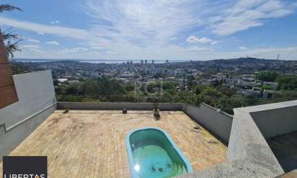 Casa para Venda - 464m², 5 dormitórios, sendo 4 suites, 4 vagas - Nonoai