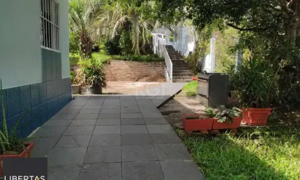 Casa com 3 quartos à venda na Rua Padre João Batista Reus, 2798, Camaquã, Porto Alegre