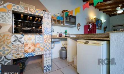 Casa em condomínio fechado com 3 quartos à venda na Avenida Eduardo Prado, 2050, Cavalhada, Porto Alegre