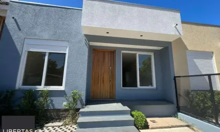 Casa com 3 quartos à venda na Rua Criciúma, 35, Guarujá, Porto Alegre
