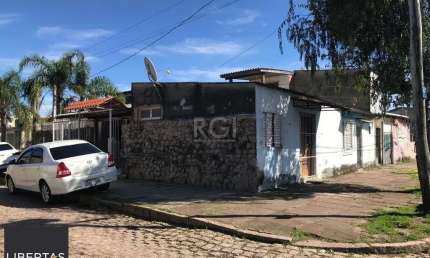 Casa com 3 quartos à venda na Acesso G, 151, Restinga, Porto Alegre