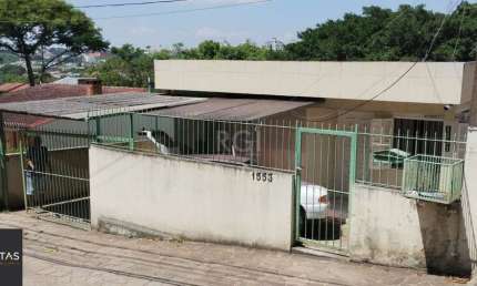 Casa com 4 quartos à venda na Avenida Vicente Monteggia, 1553, Cavalhada, Porto Alegre