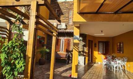 Casa com 4 quartos à venda na Rua Baldoino Bottini, 392, Hípica, Porto Alegre