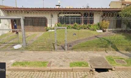 Casa com 4 quartos à venda na Rua Jacipuia, 201, Guarujá, Porto Alegre