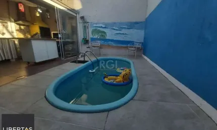 Casa com 3 quartos à venda na Rua Irmão Firmino Biazus, 230, Hípica, Porto Alegre