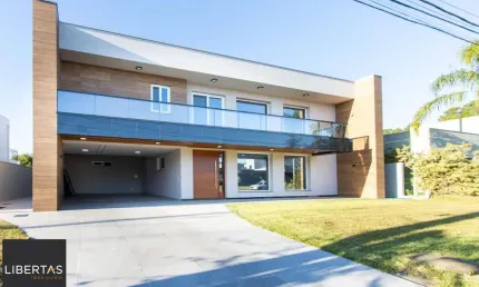 Linda Casa de 5 suítes com fundos Lago no TerraVille