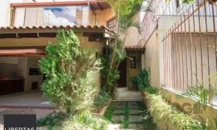 Casa com 4 quartos à venda na Rua Coronel Paulino Teixeira, 325, Rio Branco, Porto Alegre
