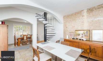 Casa com 4 quartos à venda na Rua Matias José Bins, 410, Três Figueiras, Porto Alegre