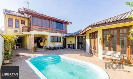 Casa de 4 dormitórios 304m² no bairro Jardim Lindóia