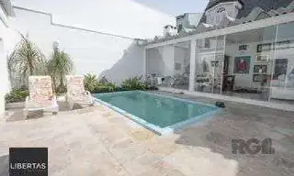 Casa com 3 quartos à venda na Rua Gustavo Schmidt, 592, Três Figueiras, Porto Alegre