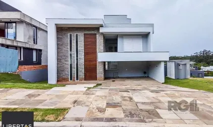 Casa em condomínio fechado com 3 quartos à venda na Estrada das Três Meninas, 1701, Vila Nova, Porto Alegre