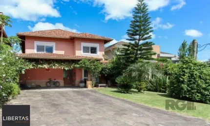 Casa em condomínio fechado com 4 quartos à venda na Avenida Juca Batista, 9000, Belém Novo, Porto Alegre