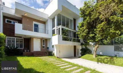 Casa com 3 quartos à venda na Avenida Fábio Araújo Santos, 1240, Nonoai, Porto Alegre