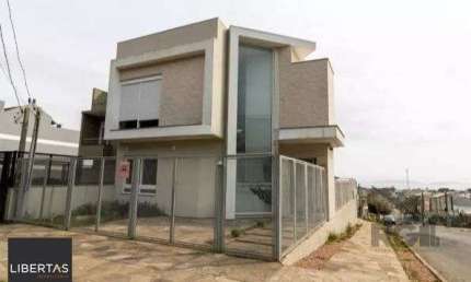 Casa com 3 quartos à venda na Rua Henrique Anawate, 520, Guarujá, Porto Alegre